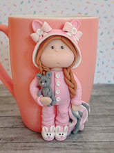 Load image into Gallery viewer, Handmade Polymer Clay 3D Girl in Pink Bunny PJs on a Pink Ceramic Mug
