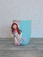 Load image into Gallery viewer, Handmade Polymer Clay 3D Girl in White Unicorn PJs on a Blue Ceramic Mug
